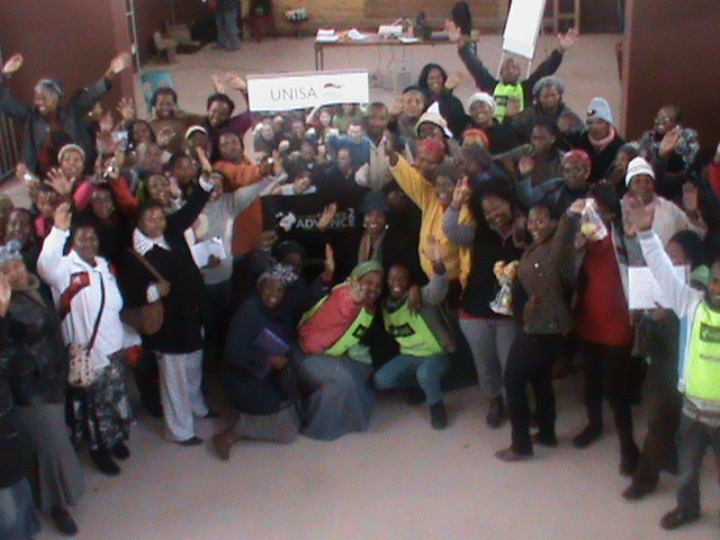 A class photo of Early Childhood Development workshop participants